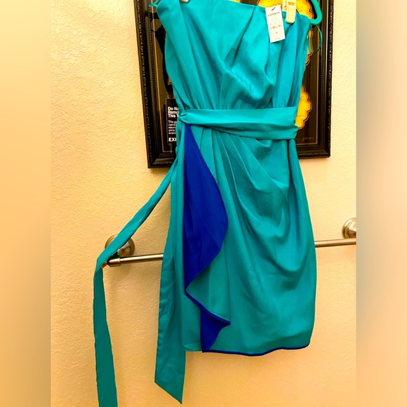 Express Dresses & Skirts - Strapless Express turquoise dress with side zipper. Wrap around tie. Size 10